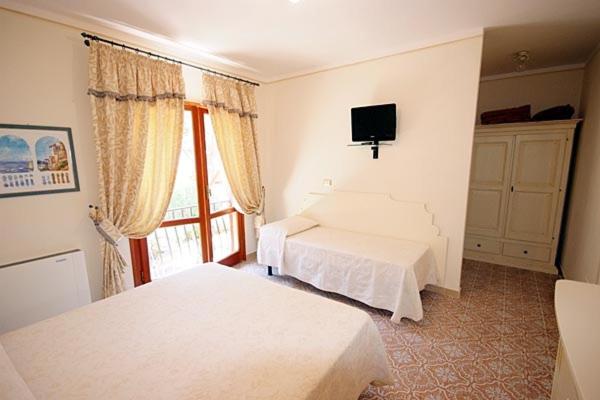 اتاق استاندارد چهار تخته, Villa Capitorsola