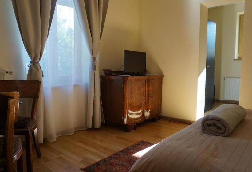 Quarto Estandar, Vila Arizto