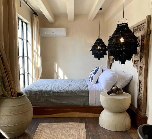 Quarto Deluxe com Sacada, Casa Realm