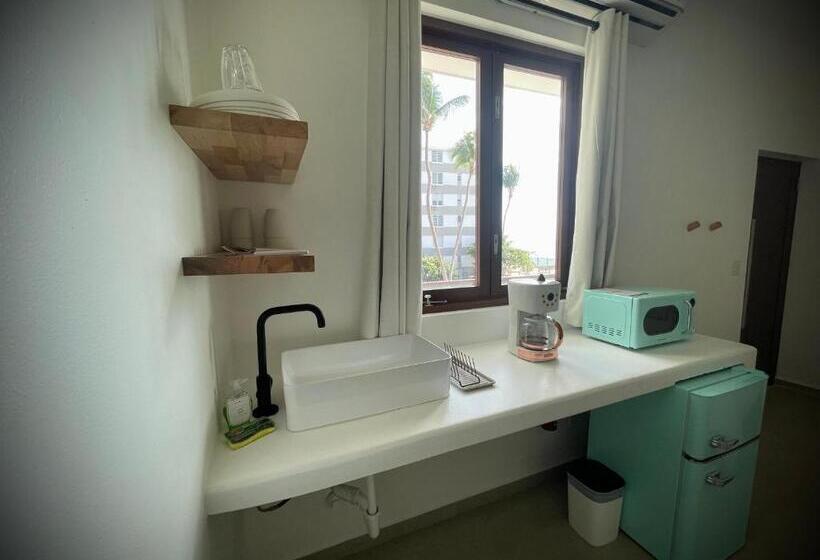 اتاق کلاسیک چهارنفره, 1 Corcega Beachfront Suites