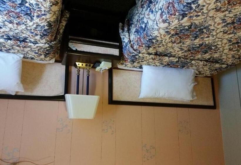 带2个双人床的标准工作室, A Voyageur S Guest House