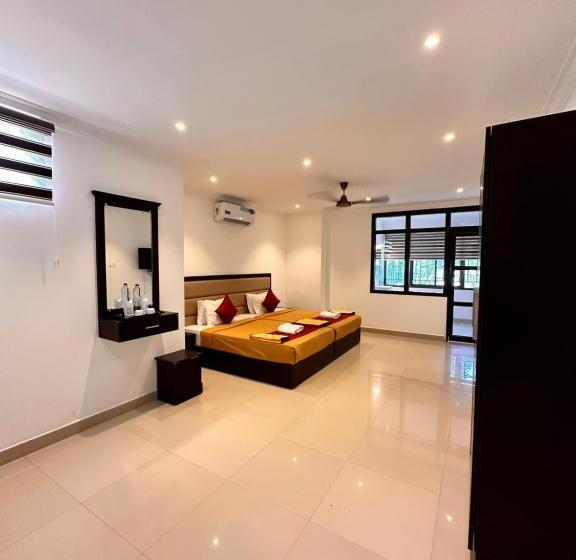 Четырехместный Номер Deluxe, Luxe Hotel Thekkady