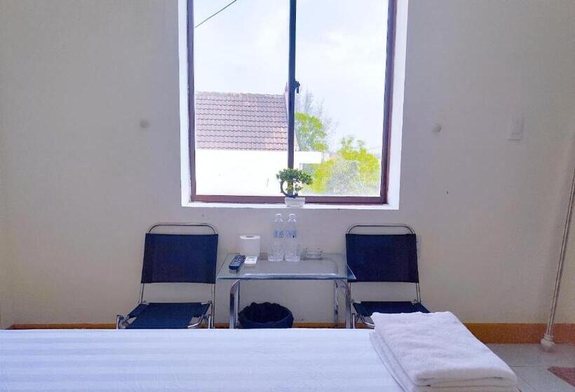 Standard Room Garden View, View Nhat Le Beach