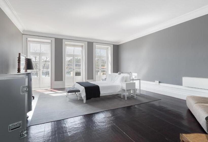 Junior suite with river view, Guestready   Innvict Building